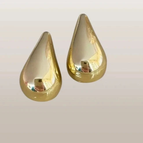 Tilgakujulised kollase kullaga kõrvarõngad
