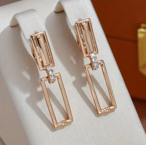 ruudukujulised_geomeetrilised_rippuvad_korvarongad_elegantne_kuldne_2jpg